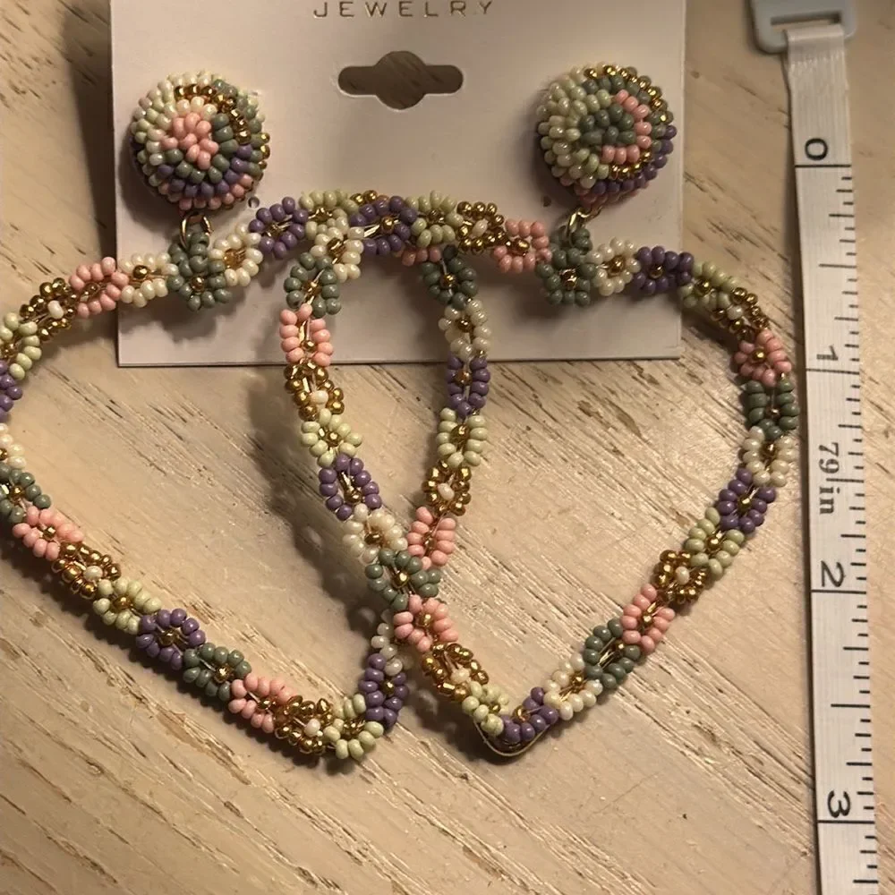 Noir floral heart shaped earrings